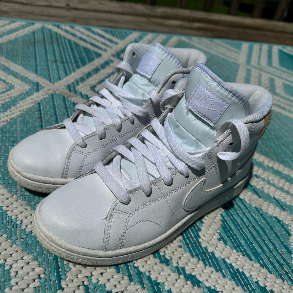 White Nike high tops